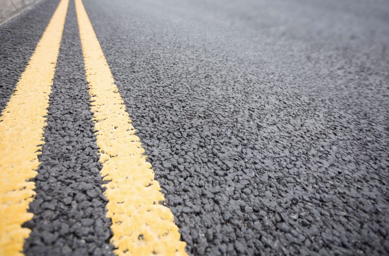 yellow-road-marking-road-surface_optimized